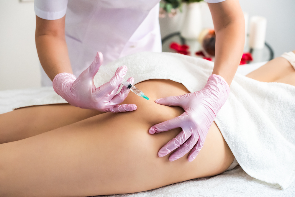 Close up of a patient receiving lipo dissolve injections to the back of her thighs to get rid of stubborn fat.